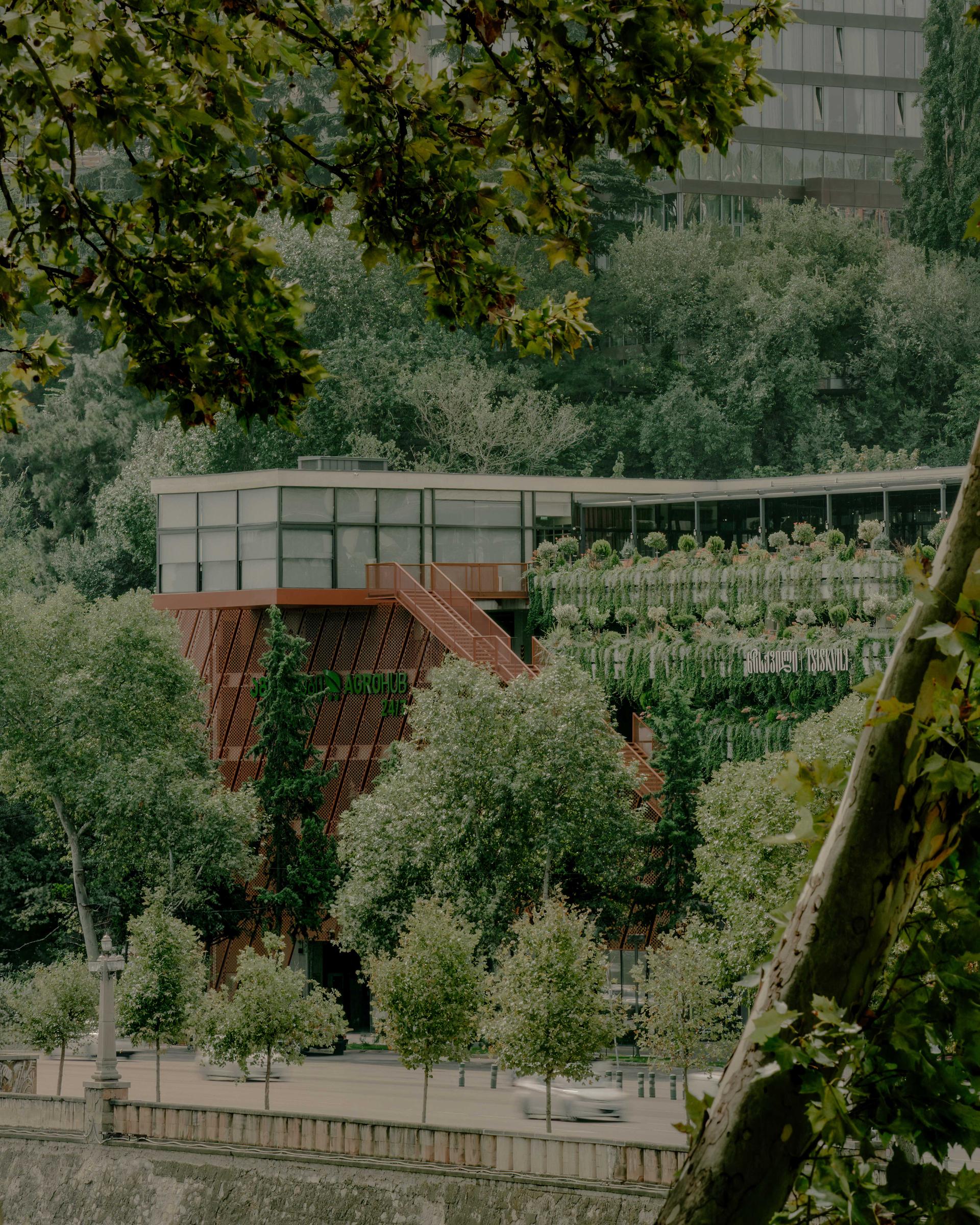 Multifunctional Landmark on the Riverbank - image 16