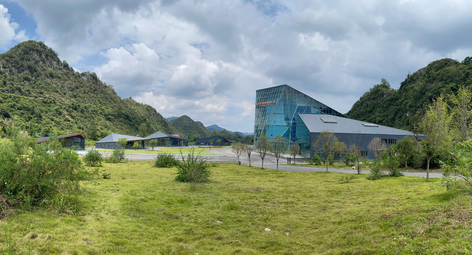 Getu Climbing Gymnasium of Ziyun - Twin Arch Timber Structure Salute to the Mountains - image 16
